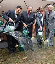 City park to get facelift // Monroe Park is about to become a construction site — bringing a temporary end to its role as a shade tree haven for college students and the homeless. 
Beginning next Monday, Nov. 14, the park is to be shut down and fenced off for at least a year and possibly as long as 18 months, according to the city, to make way for a $6 million facelift. 
A centerpiece of the city since 1851 and once used as state fairgrounds and a military encampment, the park has been targeted for major improvement for at least 12 years.    
The 8-acre park is bounded by Belvidere, Main, Laurel and Franklin streets.
Mayor Dwight C. Jones launched the long-awaited project Wednesday with representatives of Virginia Commonwealth University and the private Monroe Park Conservancy, which will manage the park after the work is done. 
The city will be investing about half the money, mostly to dig up and replace the aging underground water, sewer, natural gas and electrical lines that serve VCU, The Fan and other neighborhoods in the Near West End. 
The conservancy, a private group led by Alice McGuire Massie, has raised $3 million since 2013 to pay for additional improvements, ranging from new plantings and new walkways to improved lighting and creation of a tiny stream for racing small boats. 
Other additions are to include movable tables and chairs, a game area for playing a ring-toss game called quoits and a lawn bowling game called pétanque, the conservancy has said.  
The conservancy is seeking to raise an additional $1.5 million to redo the Checkers House in the park to provide public restrooms, space for a café and meetings along with a plaza for park visitors. 
Still, the park’s overhaul will mean upheaval for the homeless and advocates for the homeless who offer meals, clothing and services to the needy at the park. There has been no announcement of where feeding programs plan to move.


From left, Alice M. Massie, president of the Monroe Park Conservancy; Dr. Michael Rao, Virginia Commonwealth University president; Mayor Dwight C. Jones; Hunter Applewhite, president of the Dominion Foundation; Charlie Agee, Altria Group’s director of corporate contributions and community involvement; and Rossie C. Hutcheson, president of the Beirne Carter Foundation, ceremonially water the grass at Monroe Park to kick off a $6 million renovation of the centrally located park.