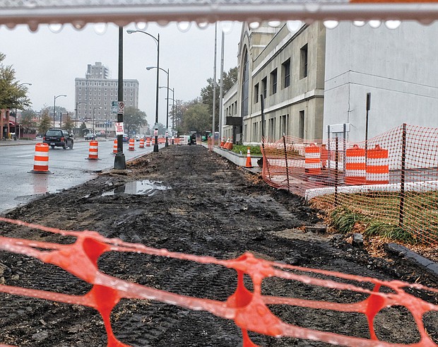 Sandra Sellars/Richmond Free Press
The first of 14 stations for GRTC’s Bus Rapid Transit is under construction. 
Work began last week on the station located on the north side of the 2200 block of West Broad Street between Allison and Strawberry streets, officials said. The work has closed the westbound curb lane on Broad Street in that area. 
Separately, the work to relocate utilities continues along the south side of Broad Street and along East Main Street to make way for additional transit stations.
About $65 million is being poured into developing the speedier bus line — dubbed The Pulse — that will run 7.6 miles between Rocketts Landing in the east to The Shops at Willow Lawn in the west. 
The city is contributing $7.6 million and Henrico County $400,000. The federal government is providing $25 million, with the state contributing the remaining $32 million. 
The Pulse is expected to be in operation next October, officials have said.