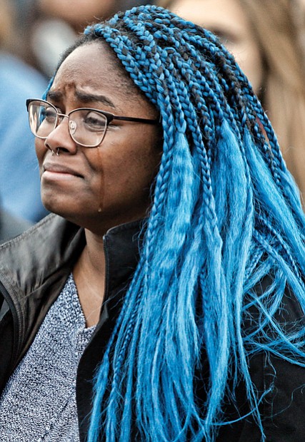Virginia Commonwealth University student Brianna Scott weeps during the anti-Trump “RVA Grabs Back Rally” last weekend.