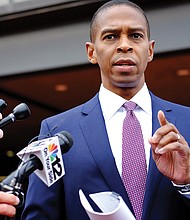 Richmond Commonwealth’s Attorney Michael N. Herring tells reporters Wednesday the investigation found no evidence to support prosecution of Mayor Dwight C. Jones or anyone in his administration. “Any referral for prosecution must be grounded in probable cause, not suspicion, not even disappointment, not even distaste, not even distrust,” he says. Location: Outside the John Marshall Courts Building in Downtown.