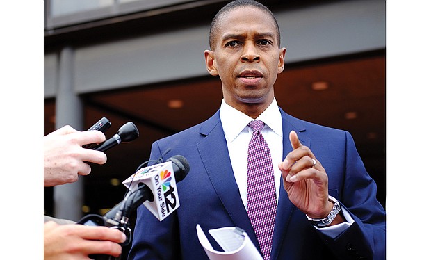 Richmond Commonwealth’s Attorney Michael N. Herring tells reporters Wednesday the investigation found no evidence to support prosecution of Mayor Dwight C. Jones or anyone in his administration. “Any referral for prosecution must be grounded in probable cause, not suspicion, not even disappointment, not even distaste, not even distrust,” he says. Location: Outside the John Marshall Courts Building in Downtown.