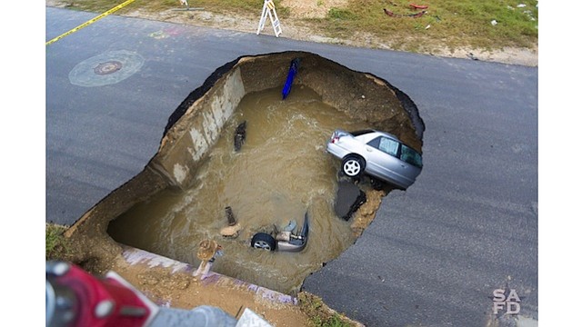 Texas Officer Dies After Car Plummets Into Sinkhole Houston Style