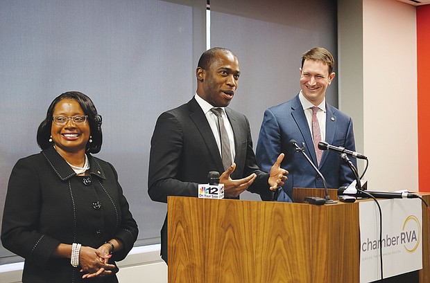 Mayor-elect Levar Stoney, center, introduces his picks for top posts during a news conference Monday. Selena Cuffee-Glenn will continue as Richmond’s chief administrative officer, while J.E. Lincoln Saunders will serve as Mr. Stoney’s chief of staff.