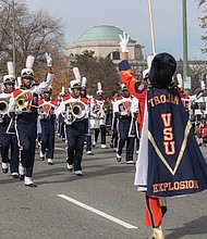 The Trojan Explosion, Virginia State University’s marching band, prepares for their next musical selection.