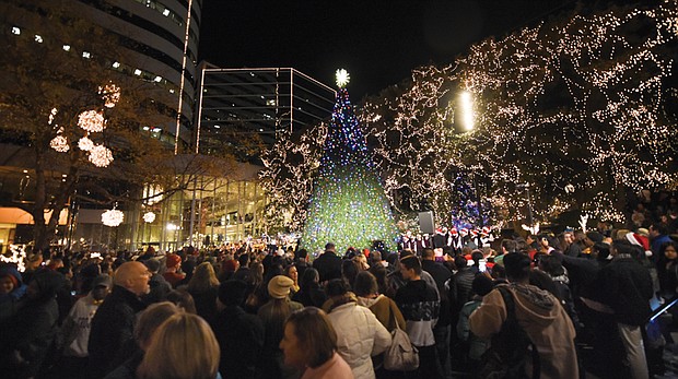 Lighting up the holidays // Richmond kicked off the holiday season last weekend with a plethora of holiday traditions, starting with the 32nd Annual Grand Illumination last Friday in Downtown. Hundreds of people of all ages were warmed by the music and entertainment as they joined the countdown at the James Center at10th and Cary streets for the lighting of Richmond’s skyline and the center’s 46-foot Christmas tree. The tree features more than 4,700 lights, and each building illuminated in Richmond’s skyline has more than 5,000 lights. Revelers also enjoyed entertainment at Main Street Station in Shockoe Bottom.
On Saturday, the holiday joy continued with the 33rd Annual Dominion Christmas Parade along Broad Street in Downtown. Thousands of spectators lined the sidewalks for the event, which featured dozens of bands, floats and entertainment from across the state. The route began at the Science Museum of Virginia and ended at Broad and 7th streets, near the Richmond Coliseum. The parade draws roughly 100,000 spectators yearly and was broadcast live on WTVR-CBS 6. 