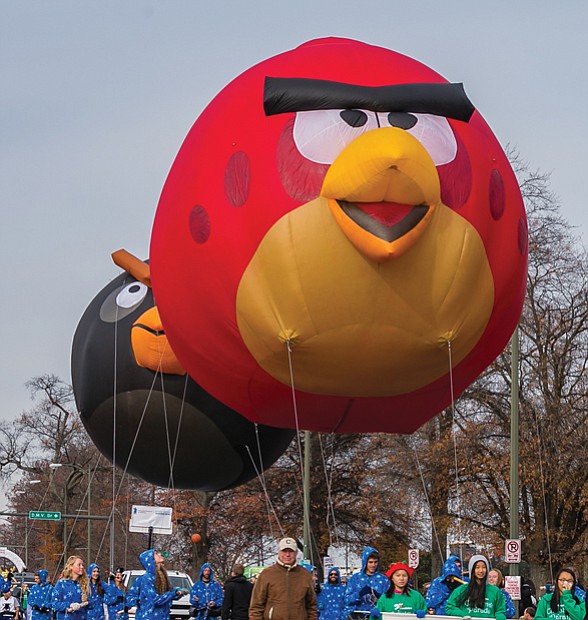 “Angry Birds” float along the parade route, bringing smiles to the crowd. 