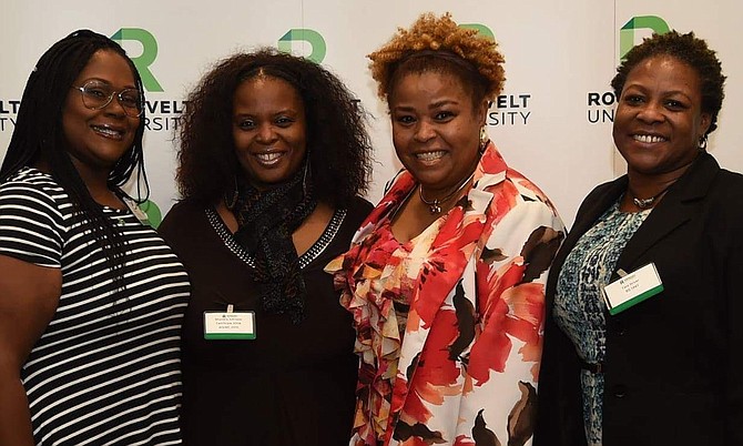 Roosevelt University South Side Alumni Chapter recently named a lounge in Roosevelt University new building, located at 430 S. Michigan Ave., in honor of the late Mayor Harold Washington. Roosevelt's South Side Alumni Chapter members were present during the ceremony. From left; Secretary, Mashanda Humphrey; newly elected President of the Roosevelt South Side Alumni Chapter, Shundra Johnson; Immediate Past President of Roosevelt South Side Alumni Chapter, Leticia Ransom; and Vice-President, Tara Driver.