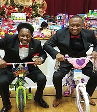 Courtesy of Jay Sharpe
Holiday test run
Jay Sharpe, right, and Kevin Stallings take a test drive on tricycles that will be given to Richmond children this holiday. The bikes are among 500 gifts donated at Mr. Sharpe’s third annual holiday party Dec. 8 to collect toys and presents for youngsters. Location: Trinity Baptist Church on North Side. The toys and gifts will be distributed through the church’s Prison Ministry. The event was co-hosted by Mr. Sharpe, a Downtown jeweler, and Antoinette Essa of WTVR CBS 6.