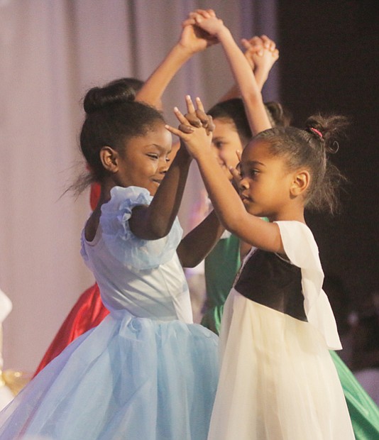 Tiny dance partners move gracefully during a scene at Virginia Union University.