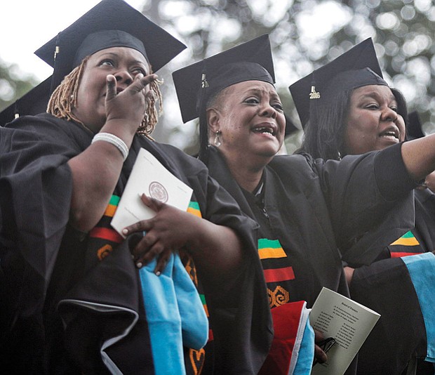 Theology school graduates at Virginia Union University, from left, Donna Cosby, Sheila Dent, Rona Evans and Alice Freeman shed tears of joy during commencement ceremonies in May. 