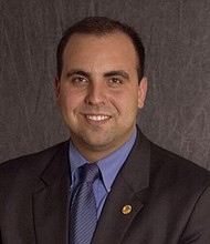 State Rep. Armando "Mando" Martinez is lucky to be alive after an apparently stray bullet hit his head during a New Year's celebration early Sunday, authorities said.