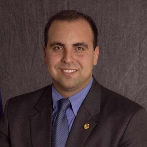 State Rep. Armando "Mando" Martinez is lucky to be alive after an apparently stray bullet hit his head during a New Year's celebration early Sunday, authorities said.