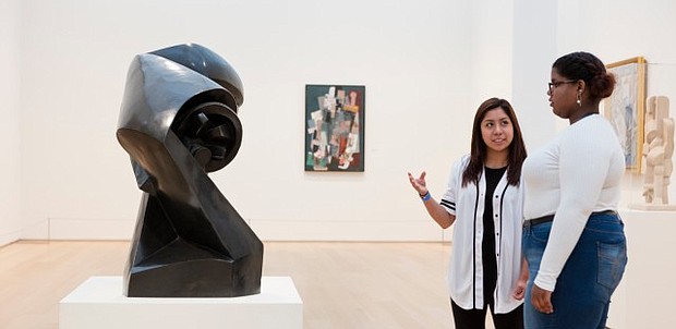 Whitney Young Magnet High School senior Rosario Barrera and Kenwood Academy High School Junior Walela Greenlee, both members of the museum’s Teen Council, in the Art Institute of Chicago’s Modern Wing (photo via wbez.org)