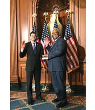 Congressman A. Donald McEachin of Henrico County takes the oath of office Tuesday as House Speaker Paul D. Ryan holds a Bible during the ceremony at the U.S. Capitol in Washington. He is the second African-American to represent Virginia in Congress since the late 1890s.
