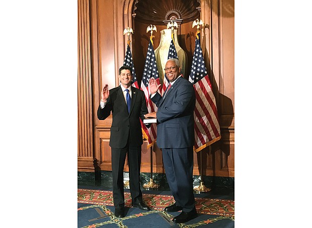 Congressman A. Donald McEachin of Henrico County takes the oath of office Tuesday as House Speaker Paul D. Ryan holds a Bible during the ceremony at the U.S. Capitol in Washington. He is the second African-American to represent Virginia in Congress since the late 1890s.