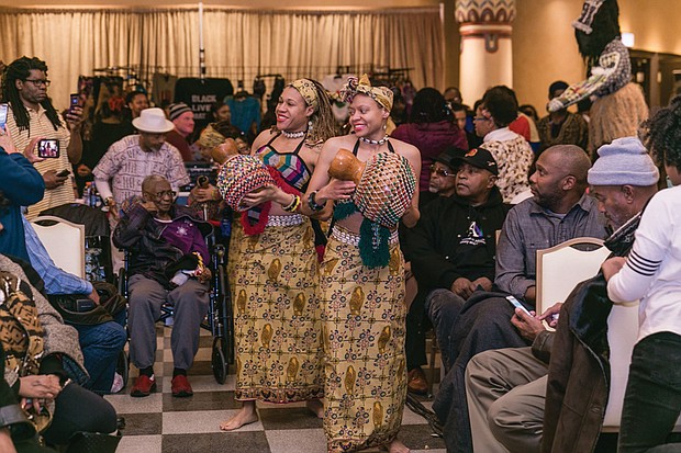 Imani Bell, left, and Casey Jones lead the procession for the 2016 Capital City Kwanzaa Festival last Friday at the Altria Theater.
Scores of people attended the annual festival produced by Janine Y. Bell of the Elegba Folklore Society. Highlights included music and dance, lectures, panels and workshops focusing on the seven principles of Kwanzaa.
