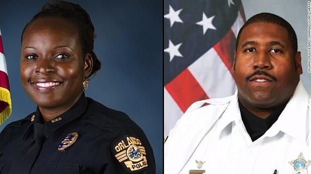 Orange County Sheriff Deputy First Class Norman Lewis (right) has been identified as the officer killed in a motorcycle accident while searching for the suspect in the shooting death of collegue police officer Master Sargent Debra Clayton (left). Clayton was killed Monday, January 9, 2017 and a manhunt is under way for the gunman who shot her, the Orlando Police Department said. Credit: Orange County Sheriff's Office/Orlando Police Department
