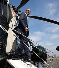 President Obama disembarks from Marine One at the Brackett Field landing zone in San Dimas, Calif., in October 2014.