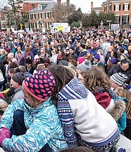 Karl Baskerville, right, was among the 2,000 participants in the March on Monument last Saturday from Allen Avenue to the Boulevard. Congressman A. Donald McEachin, below, urged the crowd to make their voices heard in Washington.