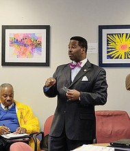 Use NAACP photo with this cutline: Delegate C.E. "Cliff" Hayes Jr., center, speaks to L.J. McCoy Jr., left, and Jesse Frierson, members of the Virginia State Conference of the NAACP, last Tuesday during the civil rights organization's annual Lobby Day at the Virginia General Assembly.