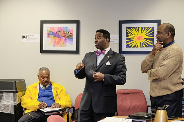 Use NAACP photo with this cutline: Delegate C.E. "Cliff" Hayes Jr., center, speaks to L.J. McCoy Jr., left, and Jesse Frierson, members of the Virginia State Conference of the NAACP, last Tuesday during the civil rights organization's annual Lobby Day at the Virginia General Assembly.