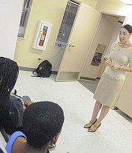 City Councilwoman Amanda Edwards speaking with Cuney Homes children