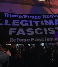 Protesters and Washington police scuffled Thursday outside a meeting of pro-Donald Trump conservatives, the first of several demonstrations aimed at disrupting the new administration's inaugural weekend.