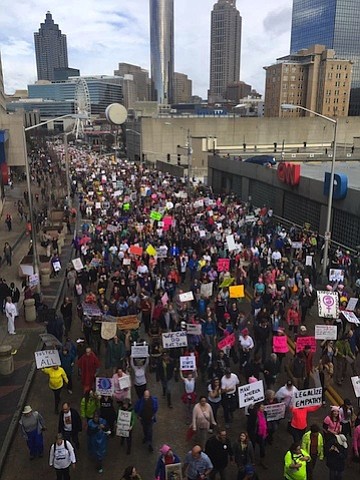 Crowds march through downtown Atlanta, Georgia in solidarity with the Women's March on Washington.