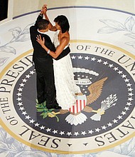 President Obama dances with his wife, First Lady Michelle Obama, at the Commander-in-Chief’s Inaugural Ball in Washington. 