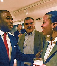 Mayor Levar M. Stoney talks with well-wishers Taquara Rashida Felix and Rob Jones during the free public reception last Saturday at The Valentine in Downtown.
