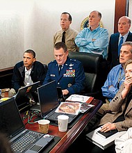 President Obama, cabinet members and staff watch inside the Situation Room as U.S. forces raid Osama bin Laden’s compound in Pakistan, killing the terrorist leader in May 2011.