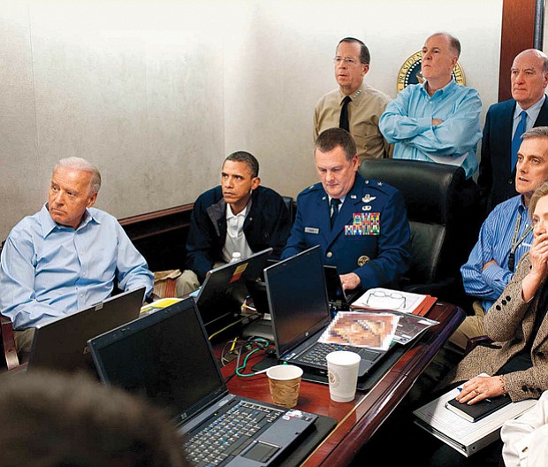 President Obama, cabinet members and staff watch inside the Situation Room as U.S. forces raid Osama bin Laden’s compound in Pakistan, killing the terrorist leader in May 2011.