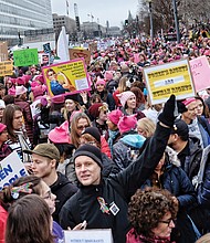 Throngs of people, many wearing signature knit pink hats, crowd Independence Avenue last saturday for the Women’s March on Washington.