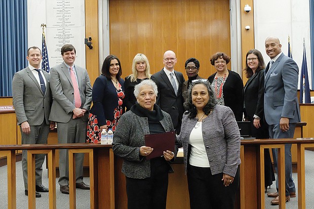 Free Press honored // The Richmond Free Press was recognized by Richmond City Council on Monday on the occasion of the newspaper’s 25th anniversary. A resolution adopted by the body lauded the independently owned and operated newspaper that has served the Richmond community since its founding by the late Raymond H. Boone on Jan. 16, 1992.
Accepting the resolution are, from left, Free Press Publisher Jean Patterson Boone, widow of the Free Press founder, and Managing Editor Bonnie V. Winston.
The resolution was presented at the meeting by City Council President Chris A. Hilbert, 3rd District, center.
Joining him are council members, from left, Andreas D. Addison, 1st District; Parker C. Agelasto, 5th District; Kimberly B. Gray, 2nd District; Reva M. Trammell, 8th District; Vice President Cynthia I. Newbille, 7th District; Ellen F. Robertson, 6th District; Kristen N. Larson, 4th District; and Michael J. Jones, 9th District.
 