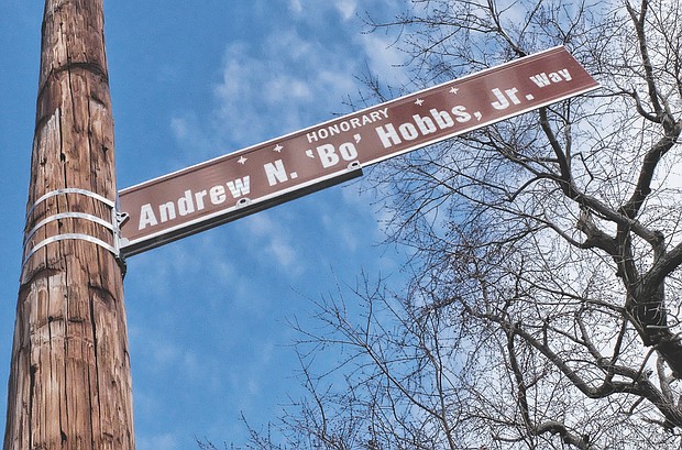 Cityscape
Slices of life and scenes in Richmond // This honorary street sign pays tribute to the late Andrew N. “Bo” Hobbs Jr., the former longtime girls’ basketball coach at Thomas Jefferson High School. Mr. Hobbs’ brother, Kevin Hobbs, right, spoke at the sign’s unveiling ceremony last Saturday.