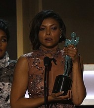 Actress Taraji P. Henson speaks after her movie, "Hidden Figures", wins outstanding performance by a cast in a theatrical motion picture at 2017 SAG Awards.