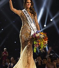 Decked out in a gold-sequined gown, French 24-year-old dental surgery student Iris Mittenaere beat 12 other finalists to take the crown of Miss Universe. As Miss Universe, she will be campaigning for dental and oral care around the world.