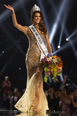 Decked out in a gold-sequined gown, French 24-year-old dental surgery student Iris Mittenaere beat 12 other finalists to take the crown of Miss Universe. As Miss Universe, she will be campaigning for dental and oral care around the world.