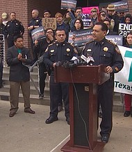 Immigration rights activists gathered outside the Harris County Sheriff’s Office in opposition to Trump’s executive orders signed Wednesday.