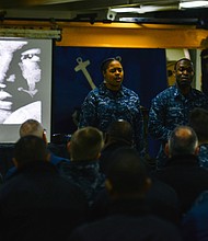 BREMERTON, Wash. (Feb. 26, 2015) Aviation Boatswain's Mate (Fuel) Airman Myste Shadie, Aviation Boatswain's Mate (Fuel) 3rd Class Carl Johnson and Aviation Boatswain's Mate (Fuel) Airman Shalida Dixon recite a poem during an African-American History Month ceremony aboard the Nimitz-class aircraft carrier USS John C. Stennis. John C. Stennis (CVN 74) is undergoing an operational training period in preparation for future deployments. (U.S. Navy photo by Mass Communication Specialist 3rd Class Ignacio D. Perez/Released)