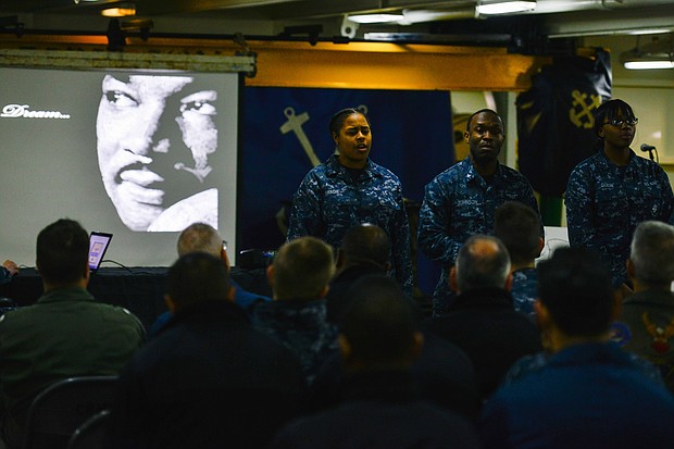 BREMERTON, Wash. (Feb. 26, 2015) Aviation Boatswain's Mate (Fuel) Airman Myste Shadie, Aviation Boatswain's Mate (Fuel) 3rd Class Carl Johnson and Aviation Boatswain's Mate (Fuel) Airman Shalida Dixon recite a poem during an African-American History Month ceremony aboard the Nimitz-class aircraft carrier USS John C. Stennis. John C. Stennis (CVN 74) is undergoing an operational training period in preparation for future deployments. (U.S. Navy photo by Mass Communication Specialist 3rd Class Ignacio D. Perez/Released)