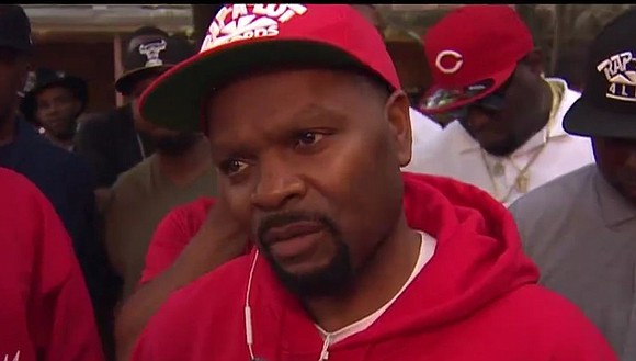 Houston’s homeless mingled with hip-hop royalty at an all-you-can-eat party downtown on Monday.