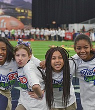 L-R Asia Thompson age 9, Amelia Fenton age 10, Cierra Lavergne age 9, Katherine Wakefield age 10 strike a pose in between drills
