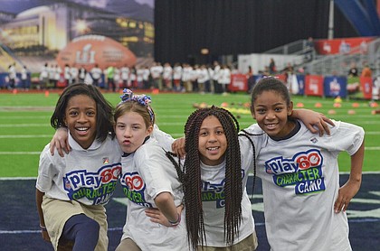 L-R Asia Thompson age 9, Amelia Fenton age 10, Cierra Lavergne age 9, Katherine Wakefield age 10 strike a pose in between drills