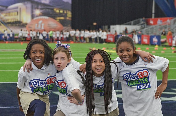 L-R Asia Thompson age 9, Amelia Fenton age 10, Cierra Lavergne age 9, Katherine Wakefield age 10 strike a pose in between drills