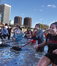 People  leave the frigid water of the James River last Saturday afternoon after the 3rd Annual Shiver in the River, a benefit for Keep Virginia Beautiful. Location: The shoreline near Brown’s Island. This view shows hearty participants headed back to land to dry off. The event, based at Historic Tredegar, also included a cleanup of litter along the riverfront and a 5K walk and run
People  leave the frigid water of the James River last Saturday afternoon after the 3rd Annual Shiver in the River, a benefit for Keep Virginia Beautiful. Location: The shoreline near Brown’s Island. This view shows hearty participants headed back to land to dry off. The event, based at Historic Tredegar, also included a cleanup of litter along the riverfront and a 5K walk and run.