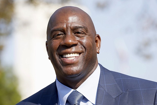 NBA and Lakers Legend Magic Johnson (photo via latimes.com)