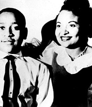 
This undated family photo shows Emmett Till with his mother, Mamie Till Mobley, in Chicago before his lynching in 1955 in Money, Miss., for supposedly making sexual advances toward Carolyn Donham, left, in a 1955 photo. She now admits her lies led to the brutal murder of the 14-year-old. 