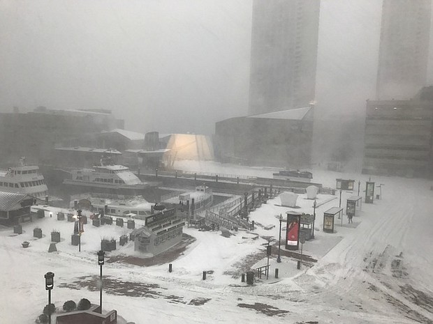 The Northeast hunkered down Thursday for what looks to be the most significant storm of the season, with as much as a foot of snow of expected in some places as well as blizzard conditions. The city of Boston is pictured here covered in snow.