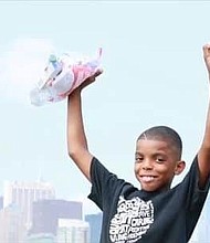 9 Year-Old Philanthropist Jahkil Jackson (photo via usatoday.com)